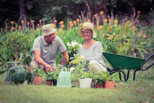 Gardener preparing tools and equipment at start of work in a residential garden